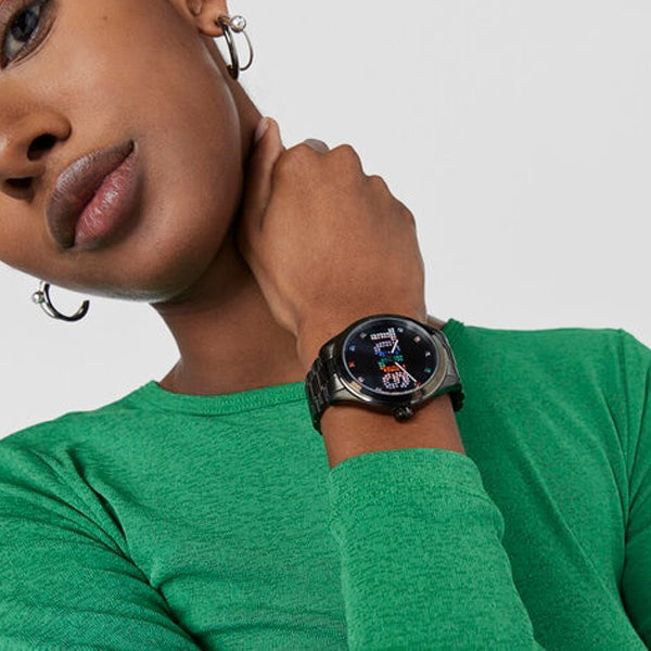 Stylish woman wearing TOUS WATCHES Mod. 200351113 displaying modern design.