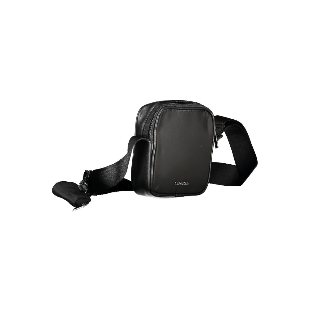 Calvin Klein Black Polyester Shoulder Bag with adjustable strap, zip closure, and logo, featuring a removable coin purse and recycled material.