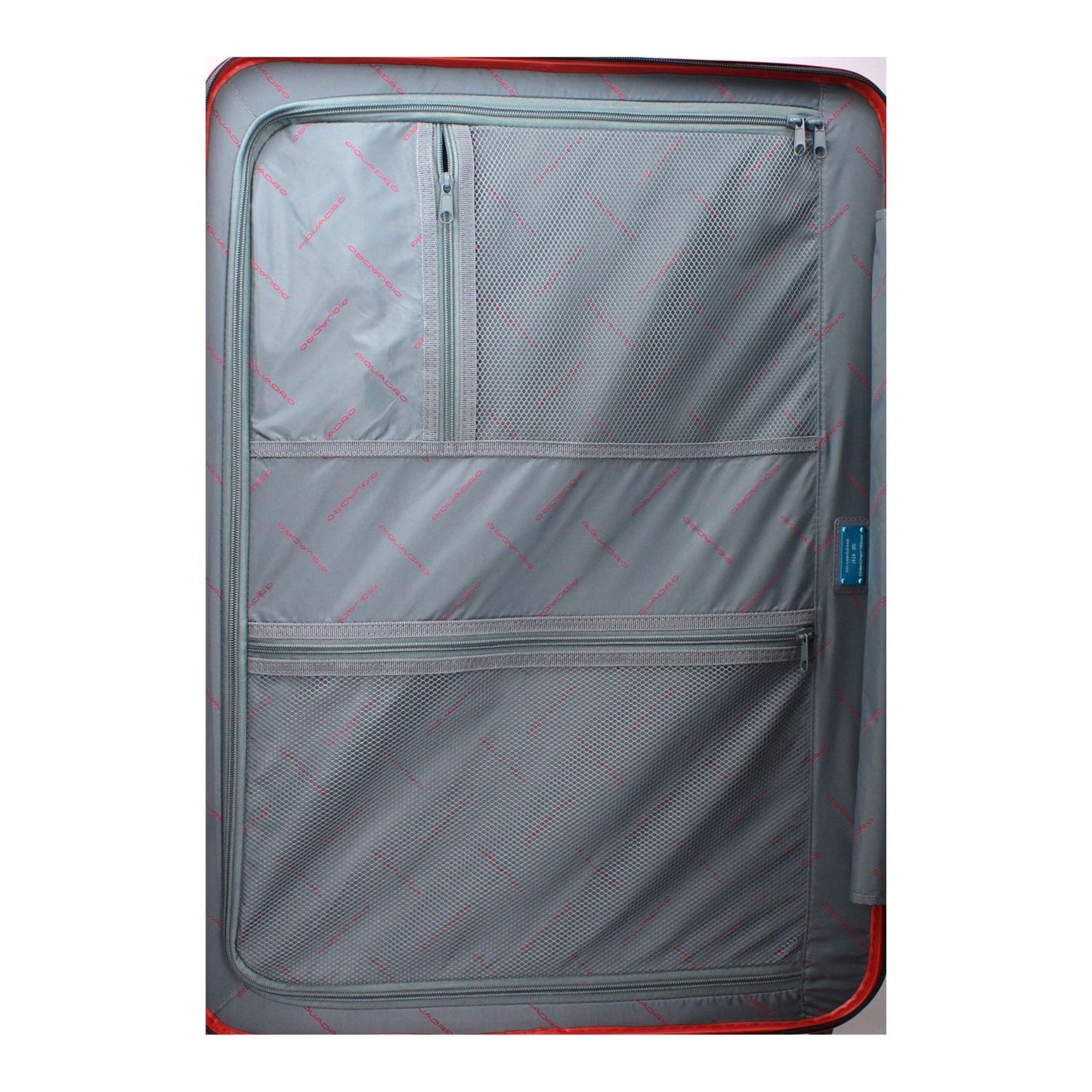 Interior view of Piquadro Red Polycarbonate Luggage And Travel showcasing zippered compartments and sleek design.