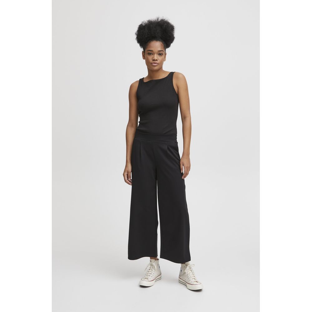Woman wearing ICHI Black Recycled Polyester Flared Pants with a modern, comfortable fit.