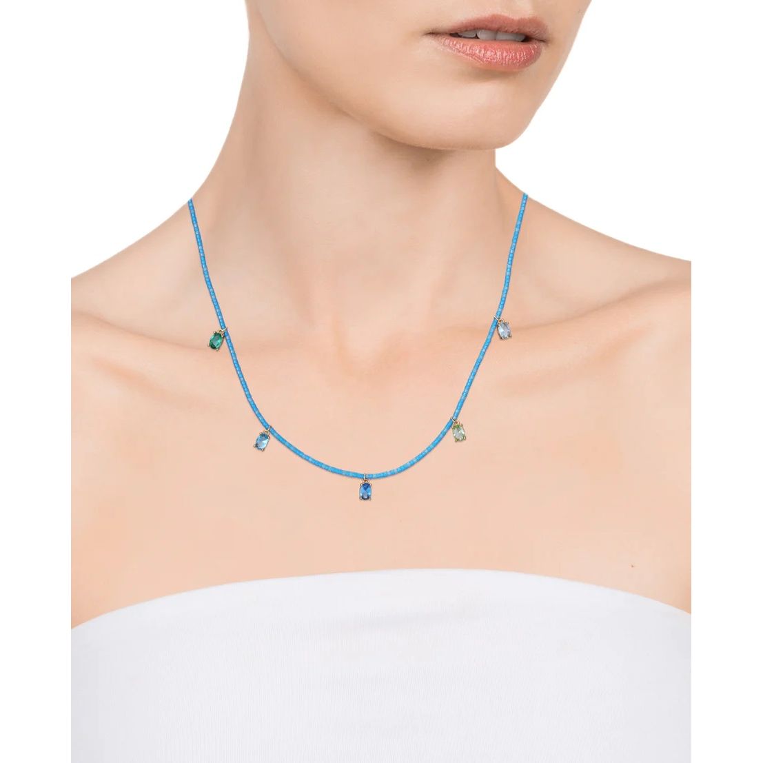 VICEROY JEWELS Mod. 13129C100-53 silver necklace on a woman's neck, featuring a quartz analog design with blue gemstones.