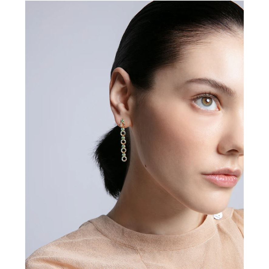 Woman wearing VICEROY JEWELS Mod. 15120E100-39 silver earrings, quartz analog, multifunction, 10 ATM water-resistant, 925° silver.