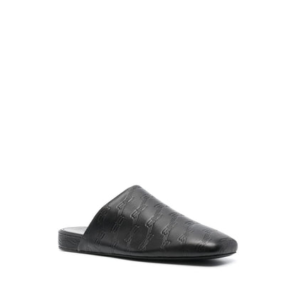 Balenciaga debossed-logo leather mules Sandals