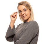 Woman wearing Yohji Yamamoto Gold Women Glasses Frame with square full-rim design and plastic demo lenses.