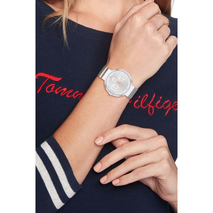 Lady wearing TOMMY HILFIGER Mod. 1782537 Quartz Analog watch, 40mm case, water resistant, in official packaging.
