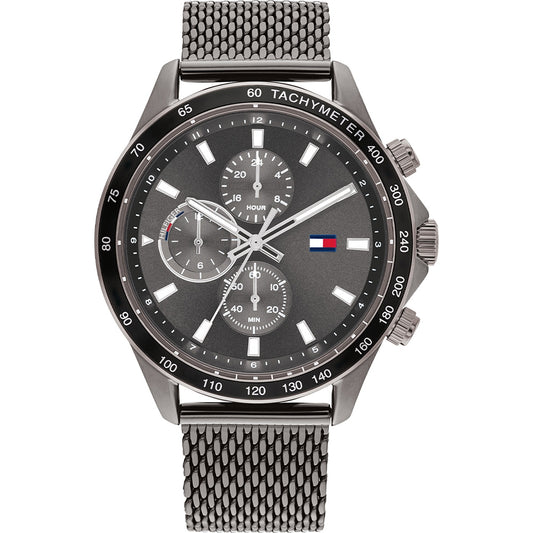 Luxury watch featuring TOMMY HILFIGER MOD. MILES design with a sleek stainless steel mesh bracelet, displaying sophisticated style.