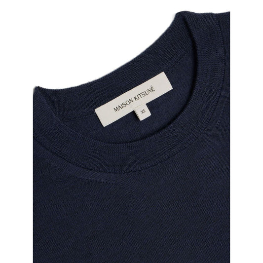Maison Kitsuné MAISON KITSUNE' Sweaters Blue close-up of navy blue merino wool crew neck with logo patch.