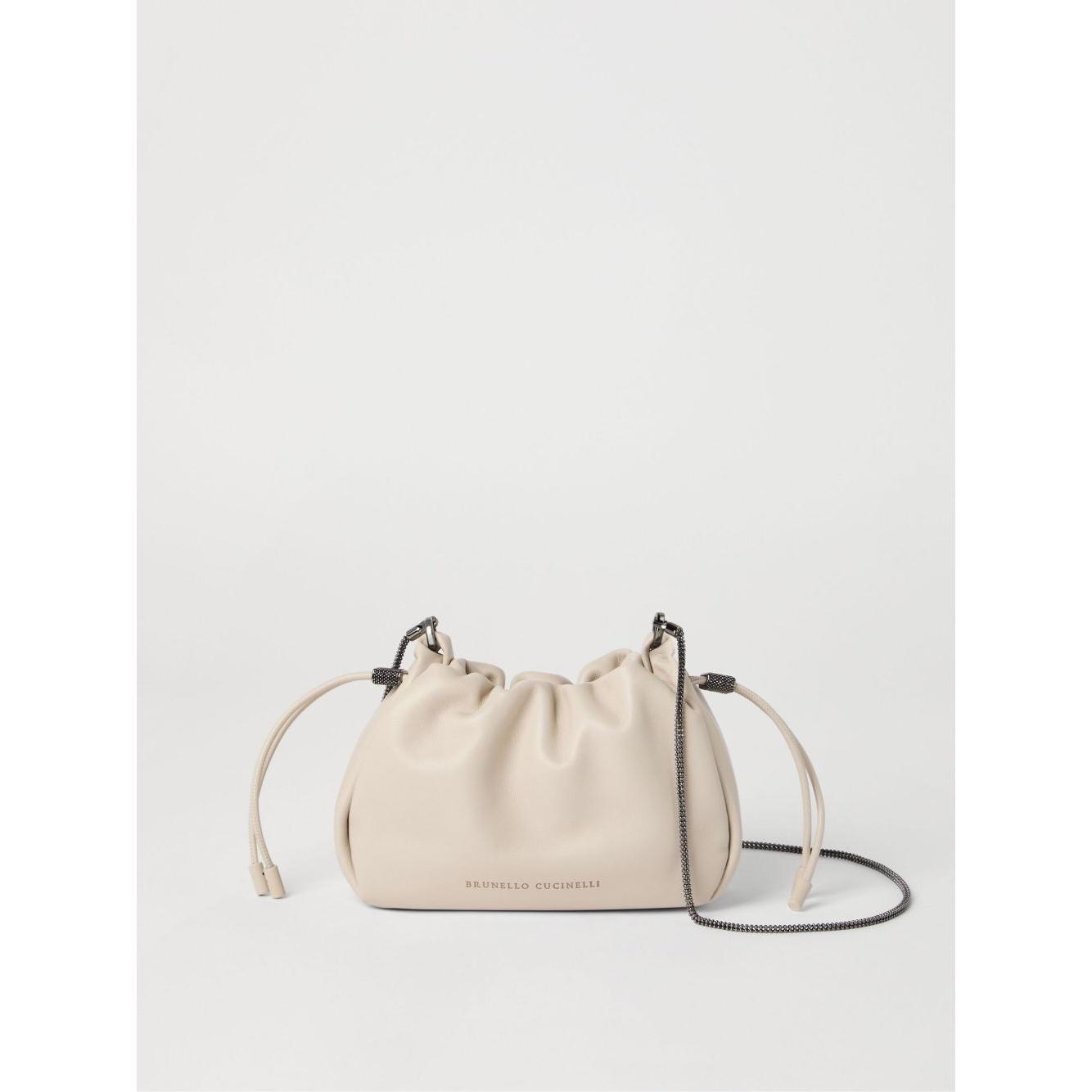 Front view with bag zipped and handles upright.