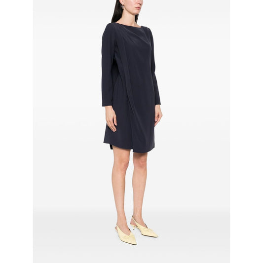Alt Tag: Model wearing Emporio Armani Dresses Blue, prussian blue Cady short dress with overlapping panel and U-neck, side view.