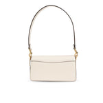 Coach Tabby 20 leather crossbody bag with removable shoulder strap and external open pocket.