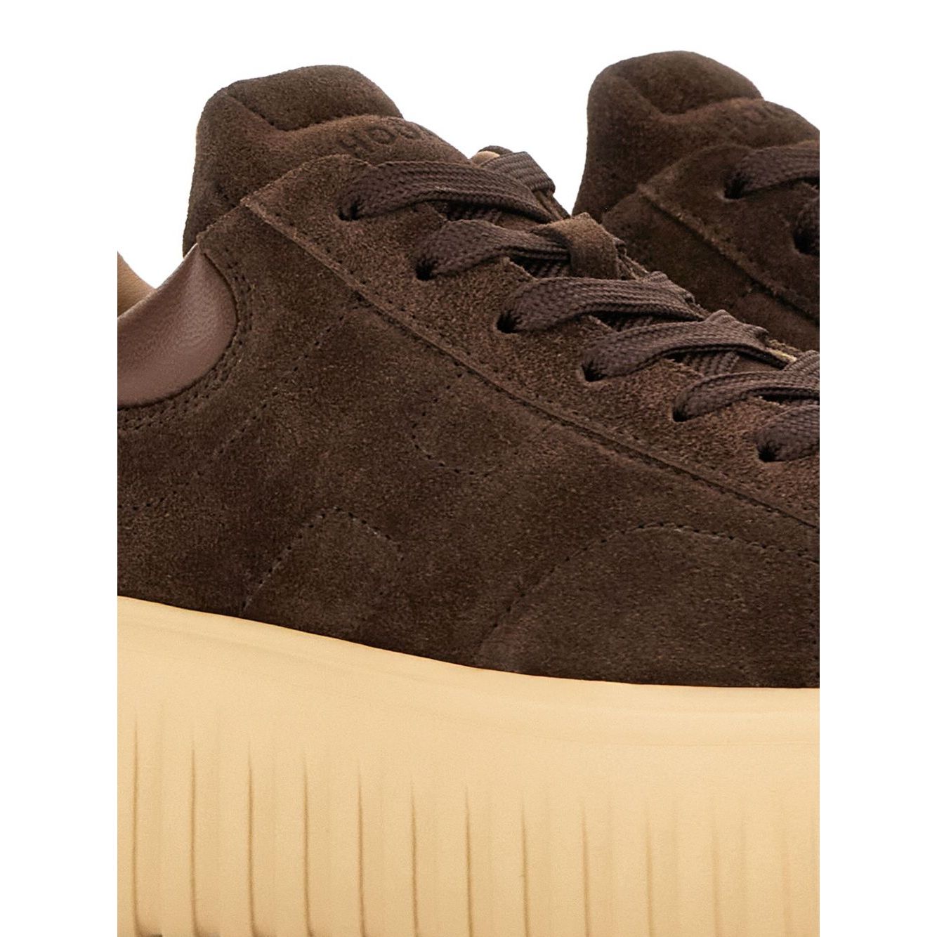 Close-up of Hogan Pre Sneakers Hogan H-Stripes in brown suede with lace-up fastening and textured sole