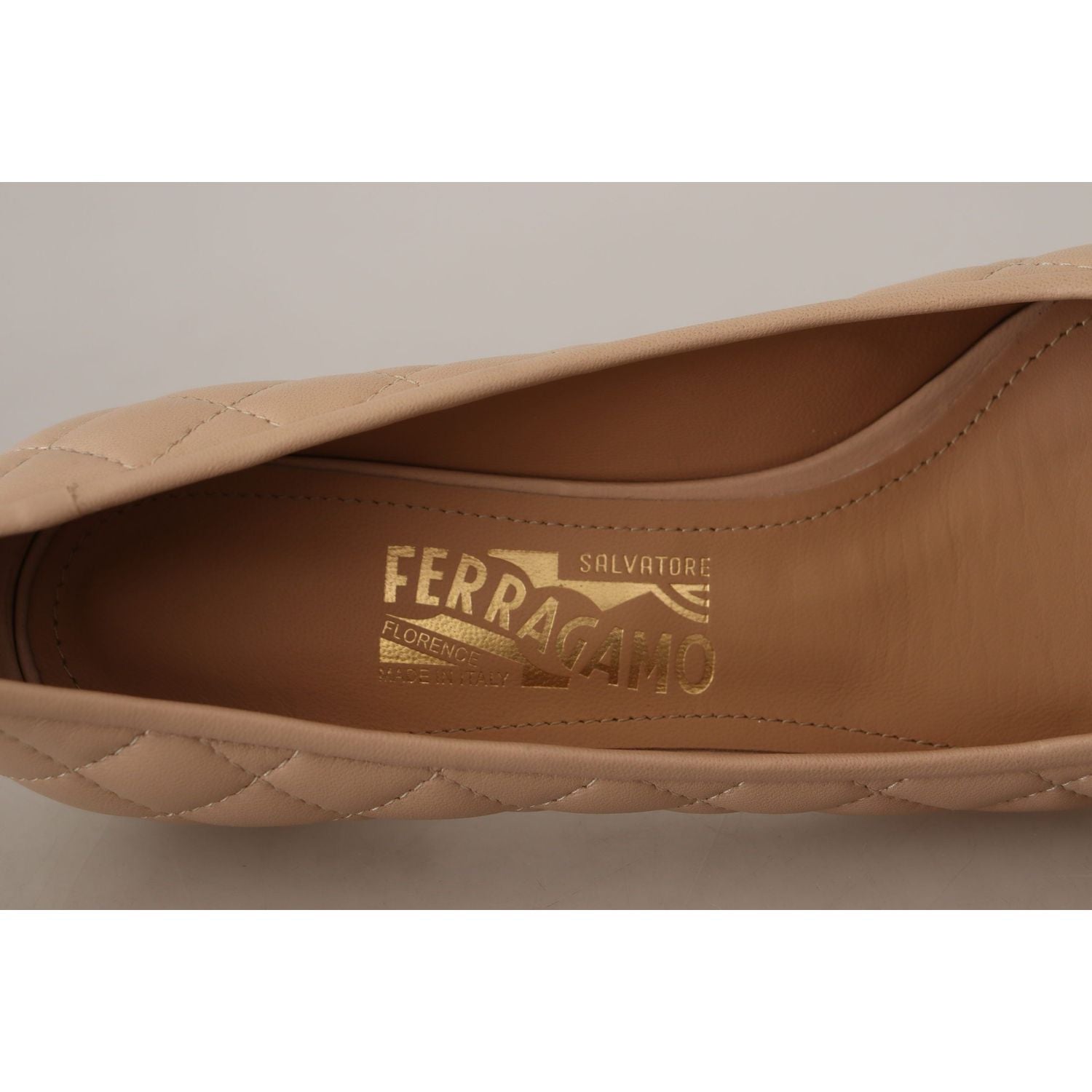 Salvatore Ferragamo Elegant Quilted Leather Pumps in Beige and Black