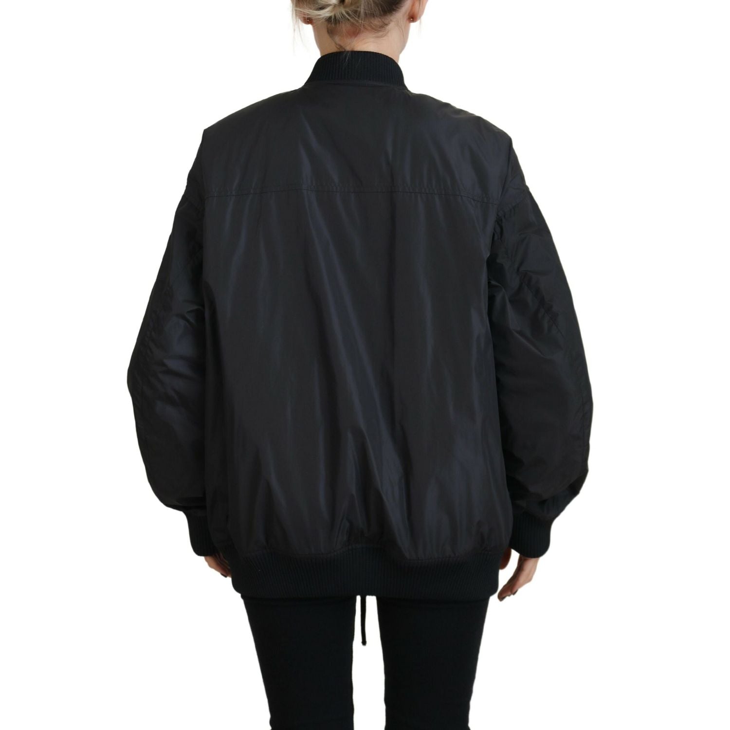 Front view with bag zipped and handles upright.