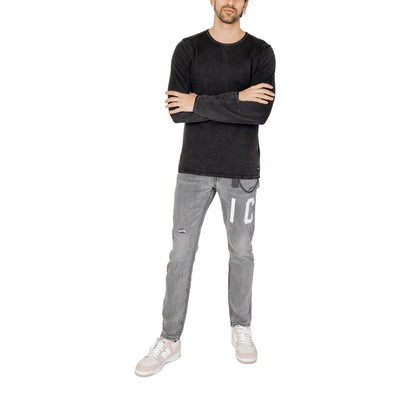 Man wearing Jack Jones Black Cotton Sweatshirt, styling casual outfit with gray jeans and sneakers, perfect for everyday wear.