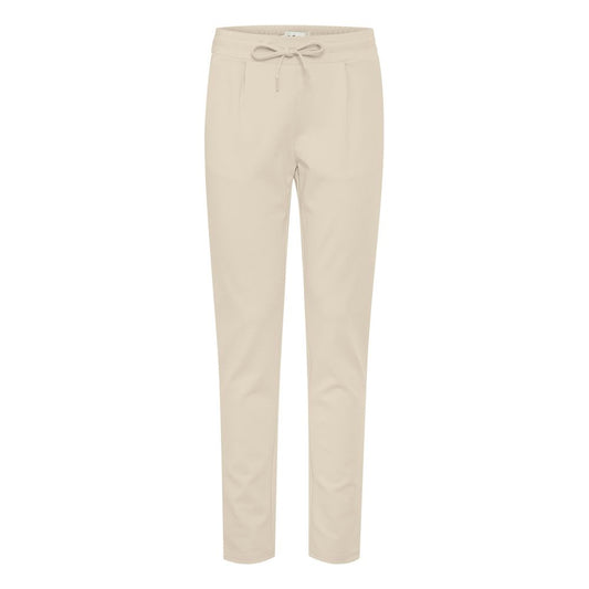 ICHI Beige Polyester Pants with slim fit, mid-rise elastic waistband, and drawstring, enhancing silhouette and comfort.