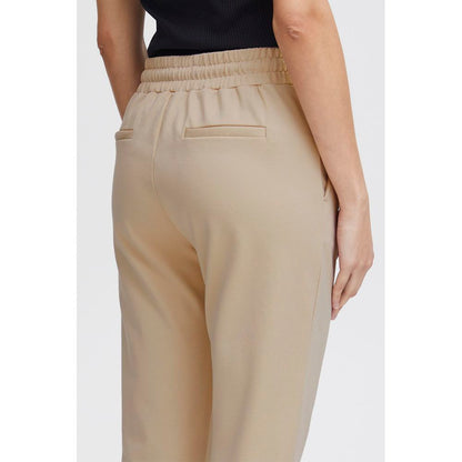 Back view of ICHI Beige Polyester Pants with elastic waistband and sleek design.