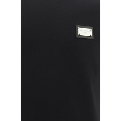 Dolce & Gabbana Black Cotton T-Shirt with engraved D&G monogram metal plaque, oversize fit, ribbed crew neck, made in Italy.