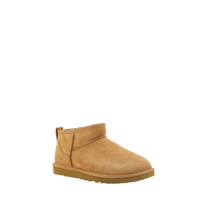 UGG Brown Goatskin Ankle Boots with shearling lining and knurled sole for durability, featuring iconic monogram on heel.