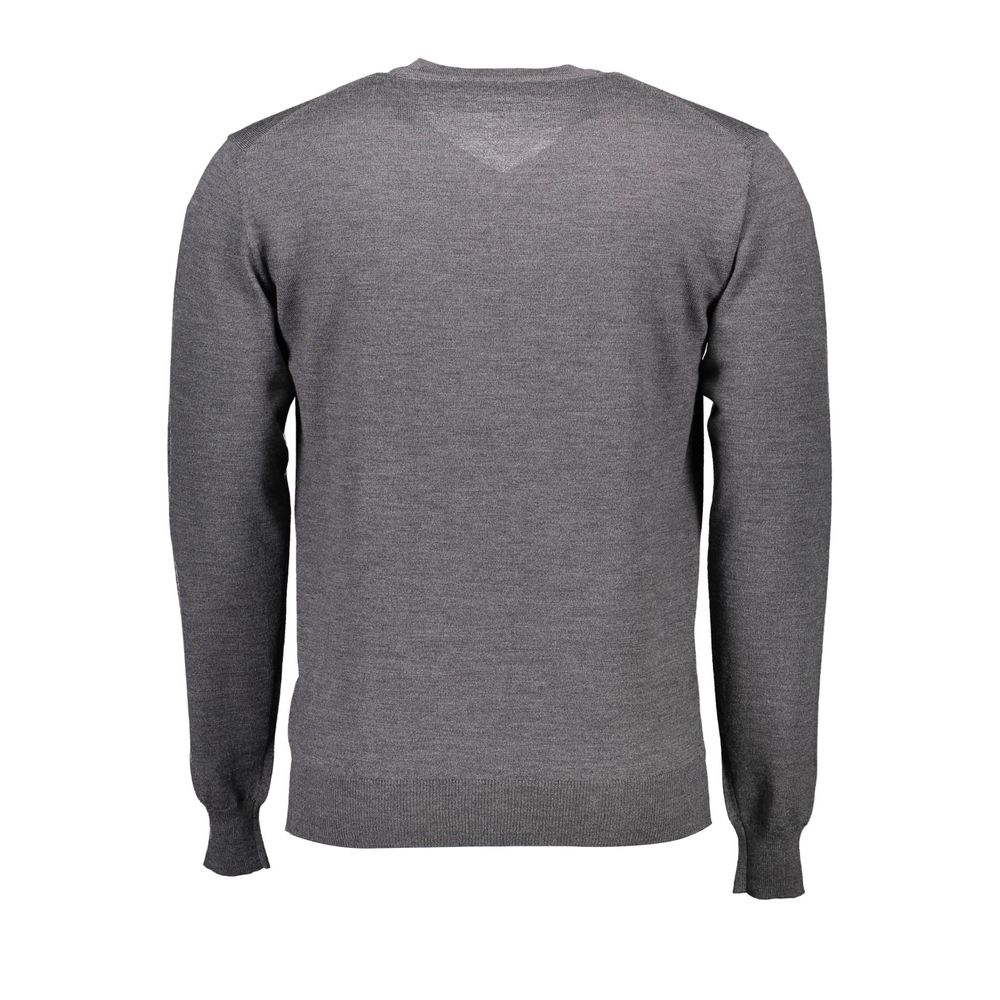 Back view of a gray wool men sweater with long sleeves and ribbed cuffs, showcasing Italian craftsmanship and classic fashion design.