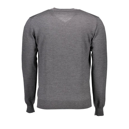 Back view of a gray wool men sweater with long sleeves and ribbed cuffs, showcasing Italian craftsmanship and classic fashion design.