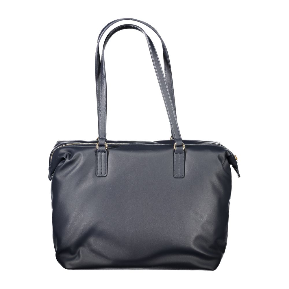 Front view with bag zipped and handles upright.