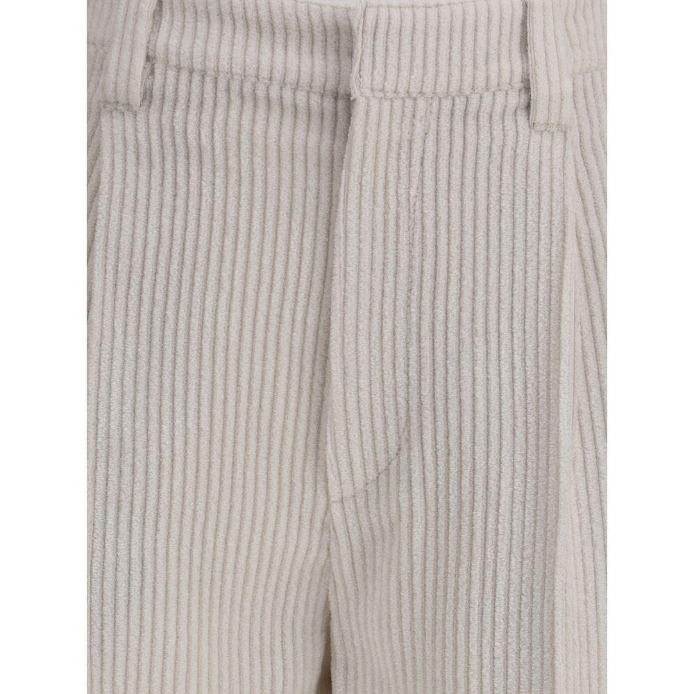 Brunello Cucinelli White Viscose Casual Pants with zip-and-button closure and ribbed texture for elegant comfort.
