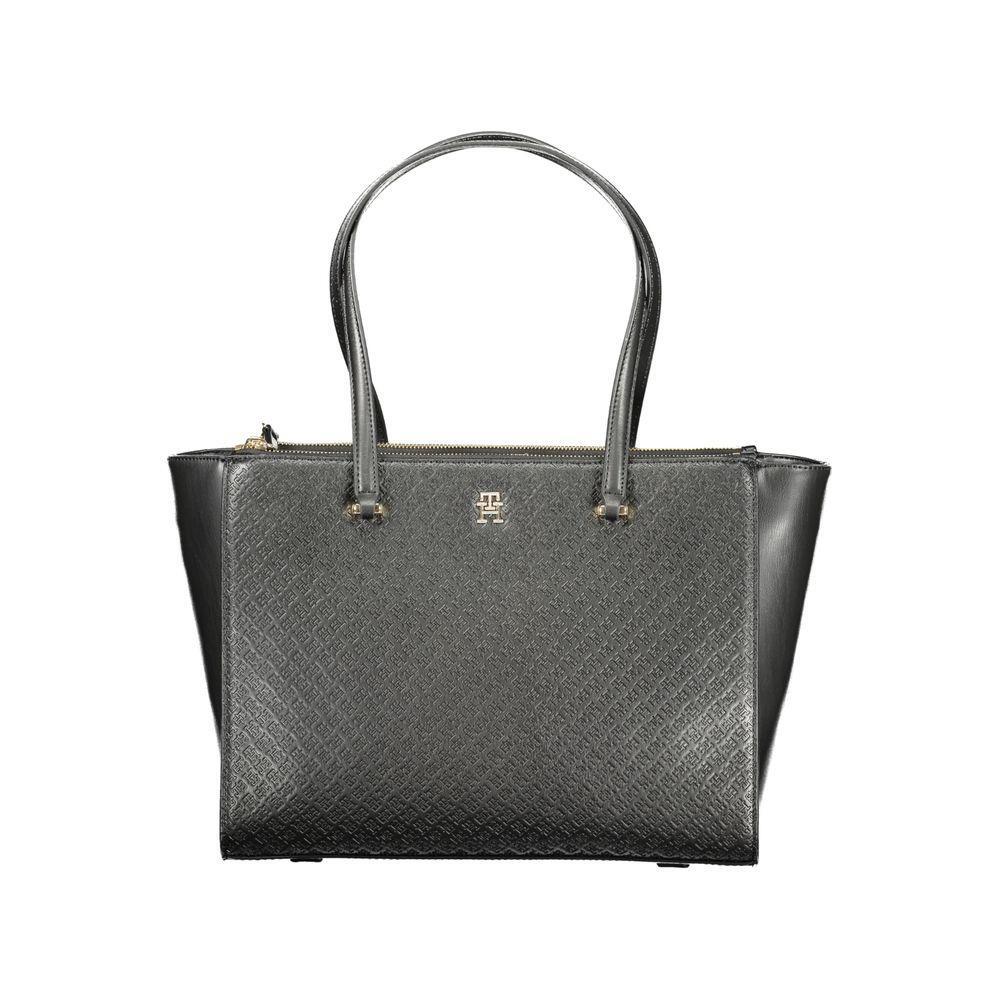 Front view with bag zipped and handles upright.