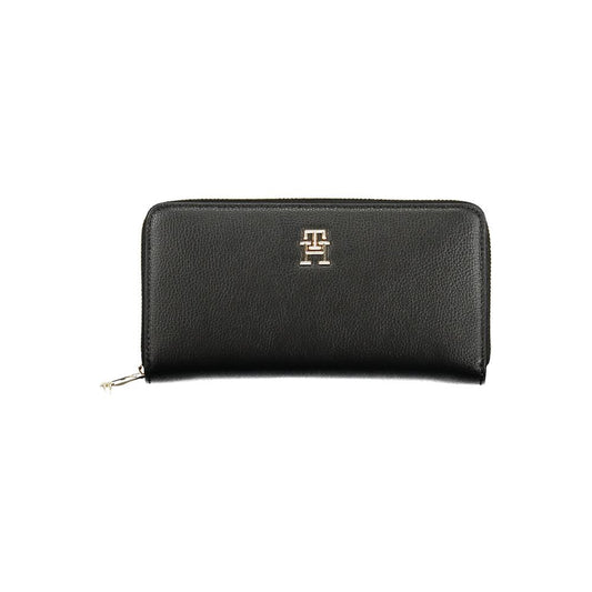 Tommy Hilfiger Black Polyethylene Women Wallet with logo and zip closure, featuring multiple compartments for cards and cash.