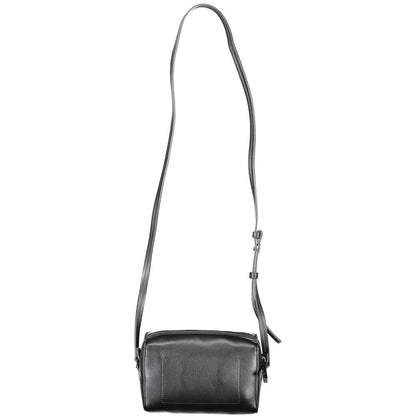 Calvin Klein Black Polyester Handbag with adjustable shoulder strap, external pocket, internal card pocket, and zip closure.