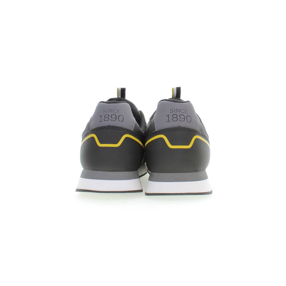 Rear view of U.S. POLO ASSN. Black Polyester Sneaker with yellow contrast details and logo on heel.