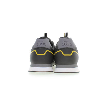 Rear view of U.S. POLO ASSN. Black Polyester Sneaker with yellow contrast details and logo on heel.