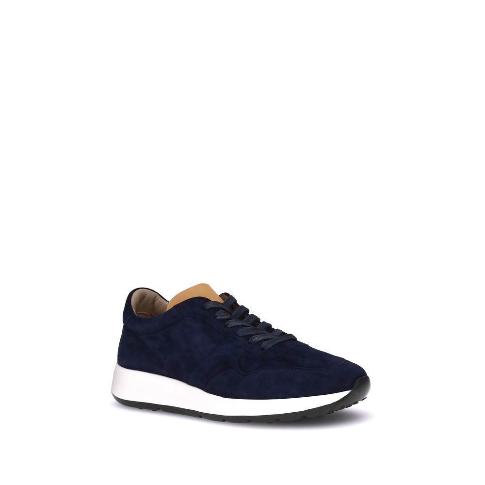Tod's Black Calf Leather Bos Taurus Low Top Sneakers in navy, showcasing sleek design and extra-light sole on white background.