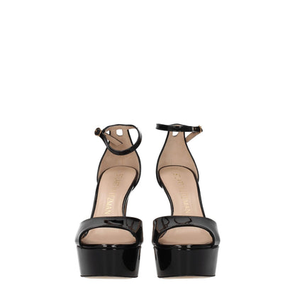 Stuart Weitzman Black Leather Platform Sandals with buckle closure and high heel in front view.