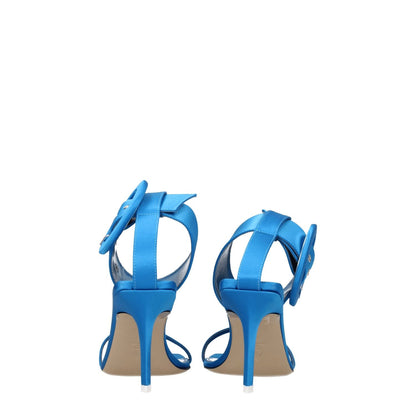 The Attico Light Blue Satin Stiletto Heel Sandals with buckle closure, leather sole, open toe, mid heels, and turquoise accents.