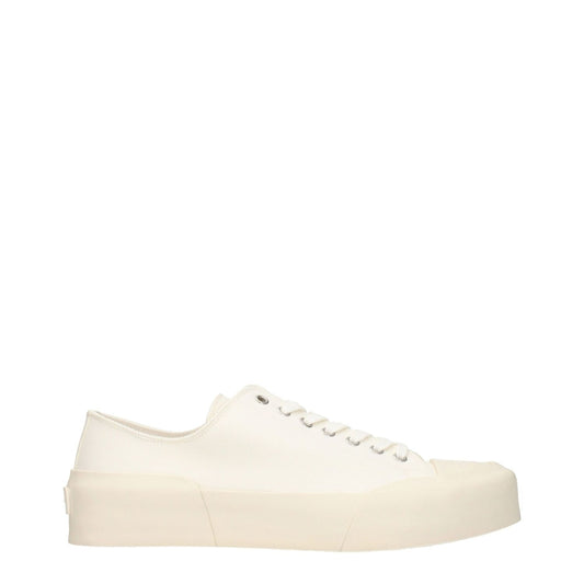 Jil Sander Beige Fabric Low Top Sneakers with round toe and rubber sole, featuring a lace-up closure and sporty glam style.