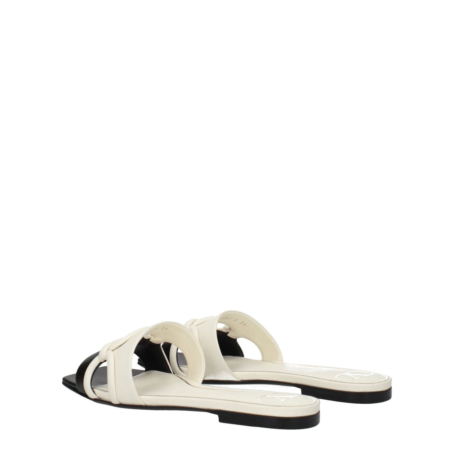 Valentino Garavani Black Leather Slippers with open toe and ivory accents, featuring a flat leather sole.