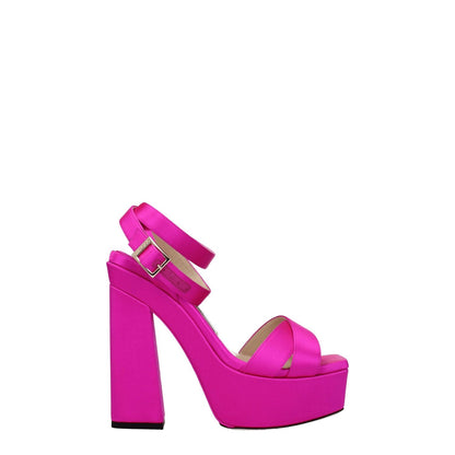 Jimmy Choo Pink Satin Platform Sandals with high heel and buckle closure in fuchsia color.