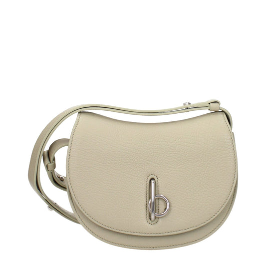 Cream leather shoulder bag with adjustable strap and silver hook closure, featuring a casual mini style design. Fashion accessory.