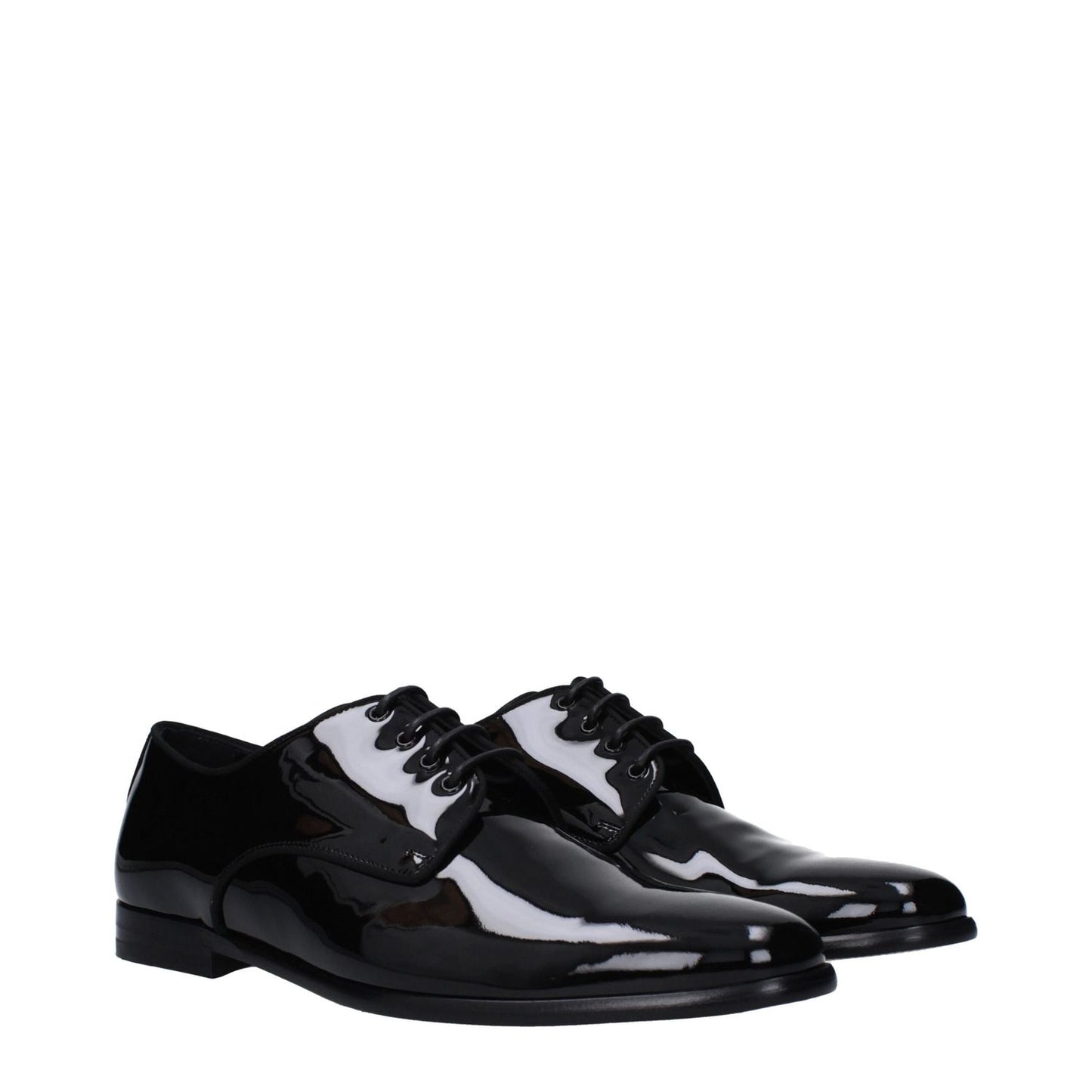 Dolce & Gabbana Black Leather Oxfords And Derbies with pointy toe, low flat heel, and lace-up closure in patent leather.