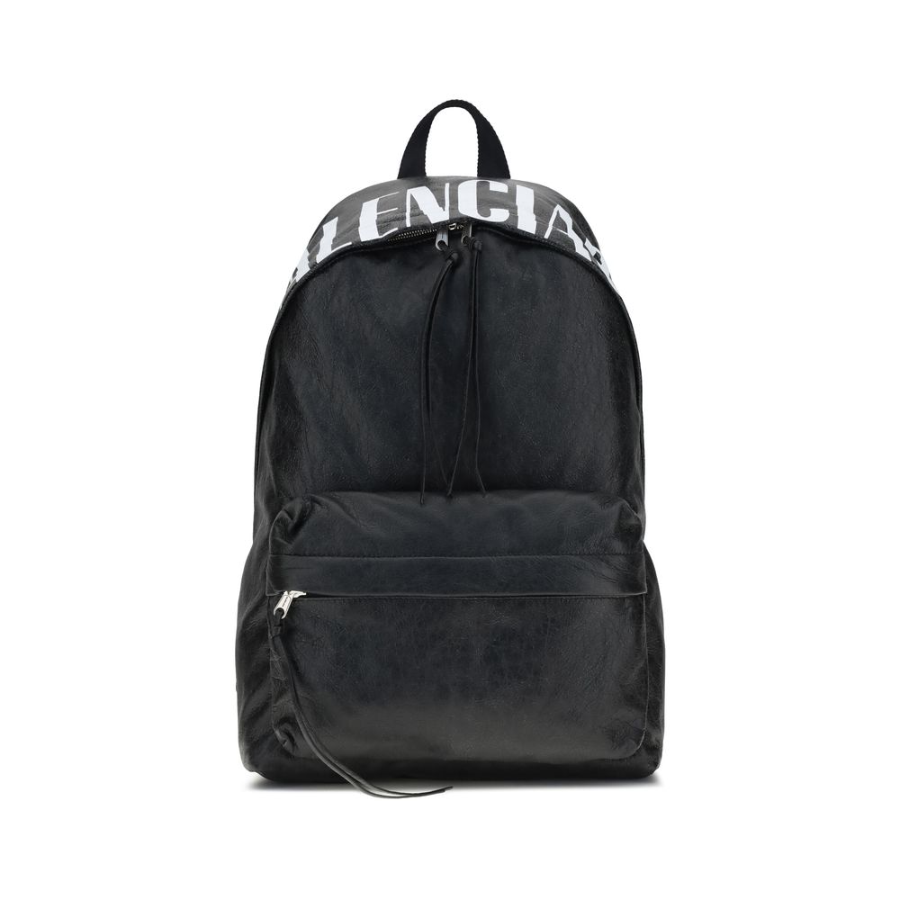 Balenciaga Black Lamb Ovis Aries Aries Backpack with crinkle effect lambskin, printed logo, and zipper closure.