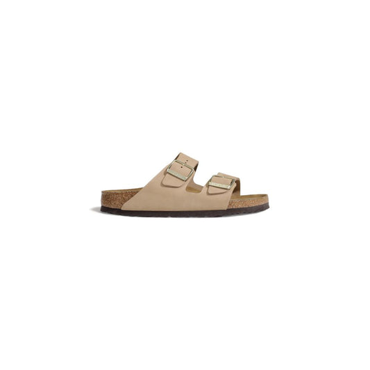 Birkenstock Beige Nubuc Leather Slippers with adjustable straps and cork footbed for comfort and style.