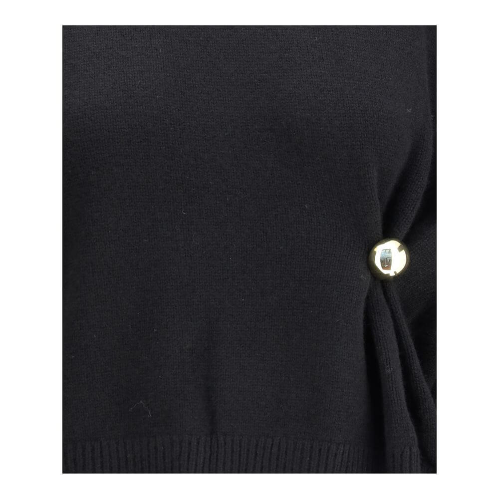 Close-up of Loulou De Saison Black Wool Sweatshirt showing gold detail and draped effect.