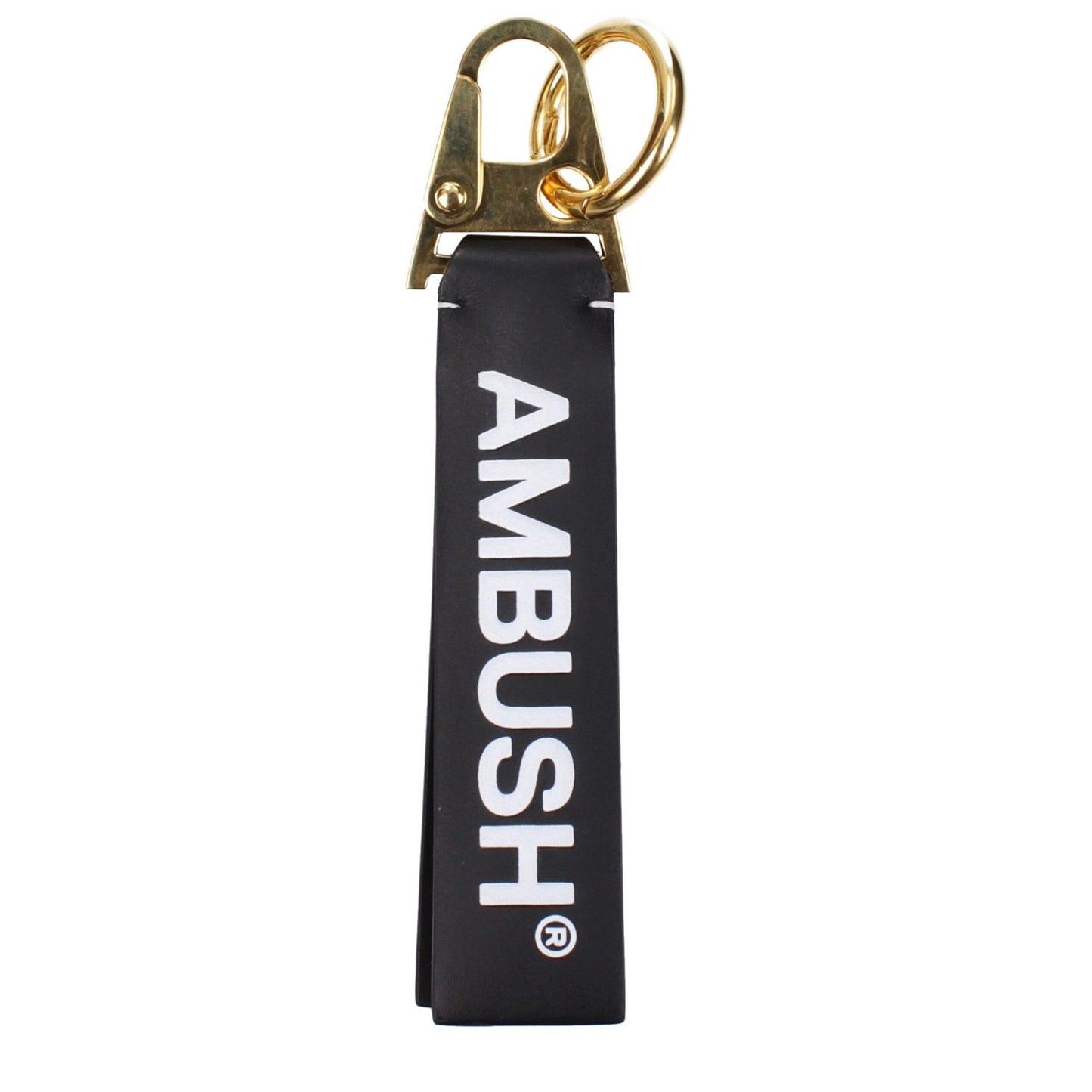 Ambush Black Leather Keychain with vintage effect and logo detailing, featuring a gold clasp and ring. Model MPN: BMNF003S22LEA0011076.