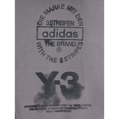 Y-3 Gray Cotton Sweatshirt with bold graphic print and stacked logo by Adidas, showcasing avant-garde style and urban aesthetics.