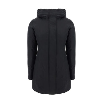 Back view of Woolrich Black Nylon Parka with hood, padded inner lining, and brand logo patch on shoulder for AW25 season.