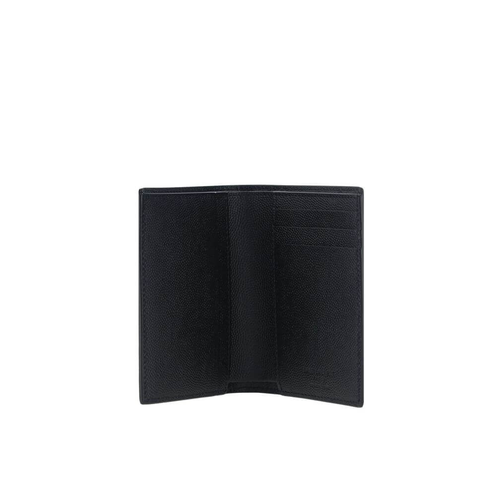 Saint Laurent Black Calf Leather Bos Taurus Wallet open to show interior with card slots and bill compartment, made of grained calfskin.