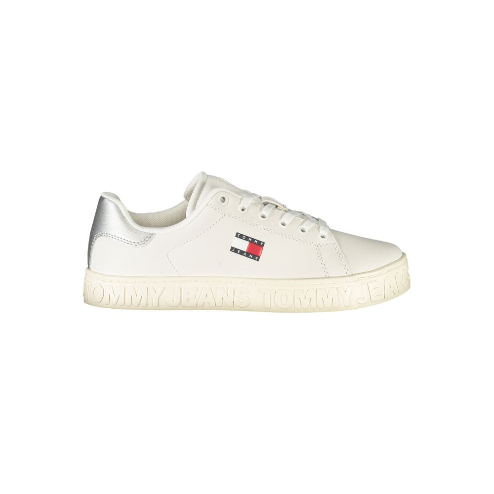Tommy Hilfiger White Leather Women Sneaker with silver accents and iconic logo, featuring a comfortable removable footbed.