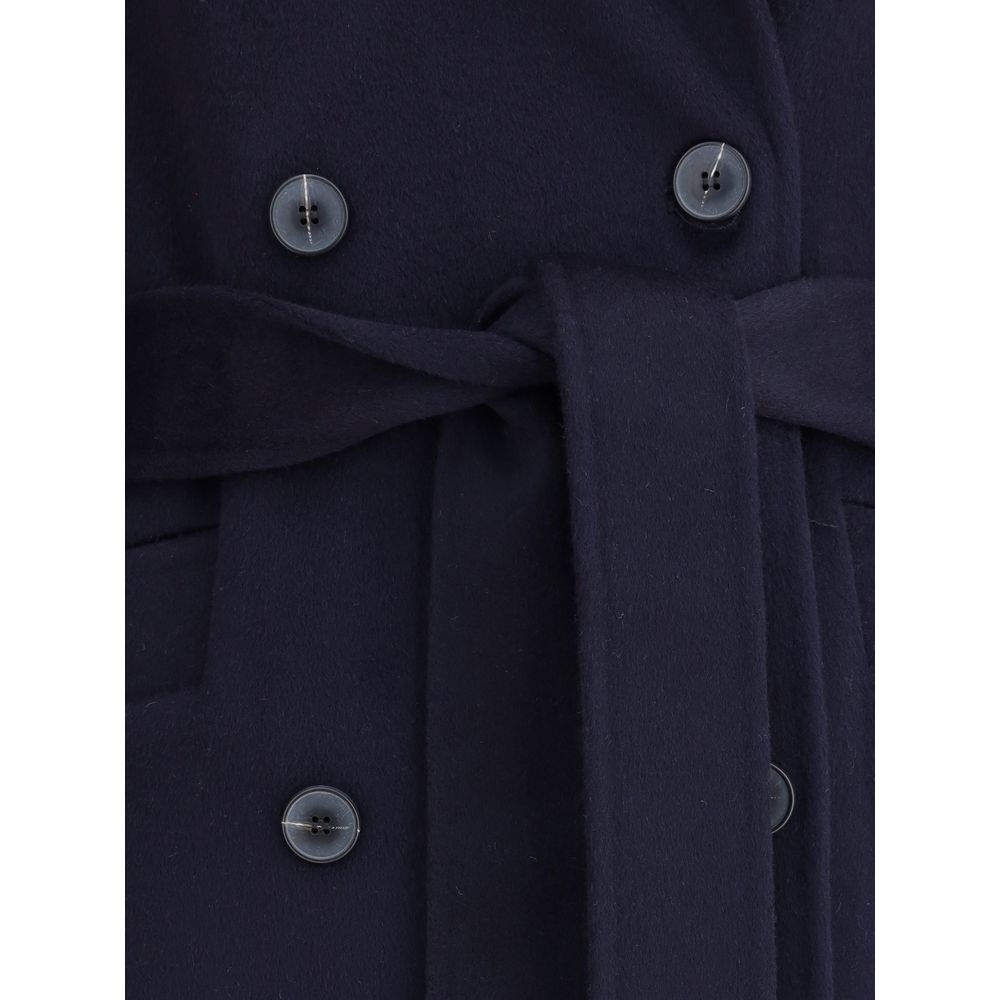 Close-up of Dynamis Studio Blue Wool Coat showing double-breasted buttons and belt, highlighting the refined style and craftsmanship.