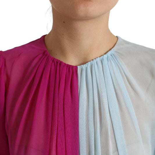 Dolce & Gabbana Light Blue Silk Two Tone Midi Dress featuring fuchsia and light blue pleated fabric, close-up view of neckline.
