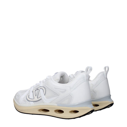 Valentino Garavani White Fabric Athletic Sneakers with rubber sole and lace-up closure, featuring front, side, and back logo designs.